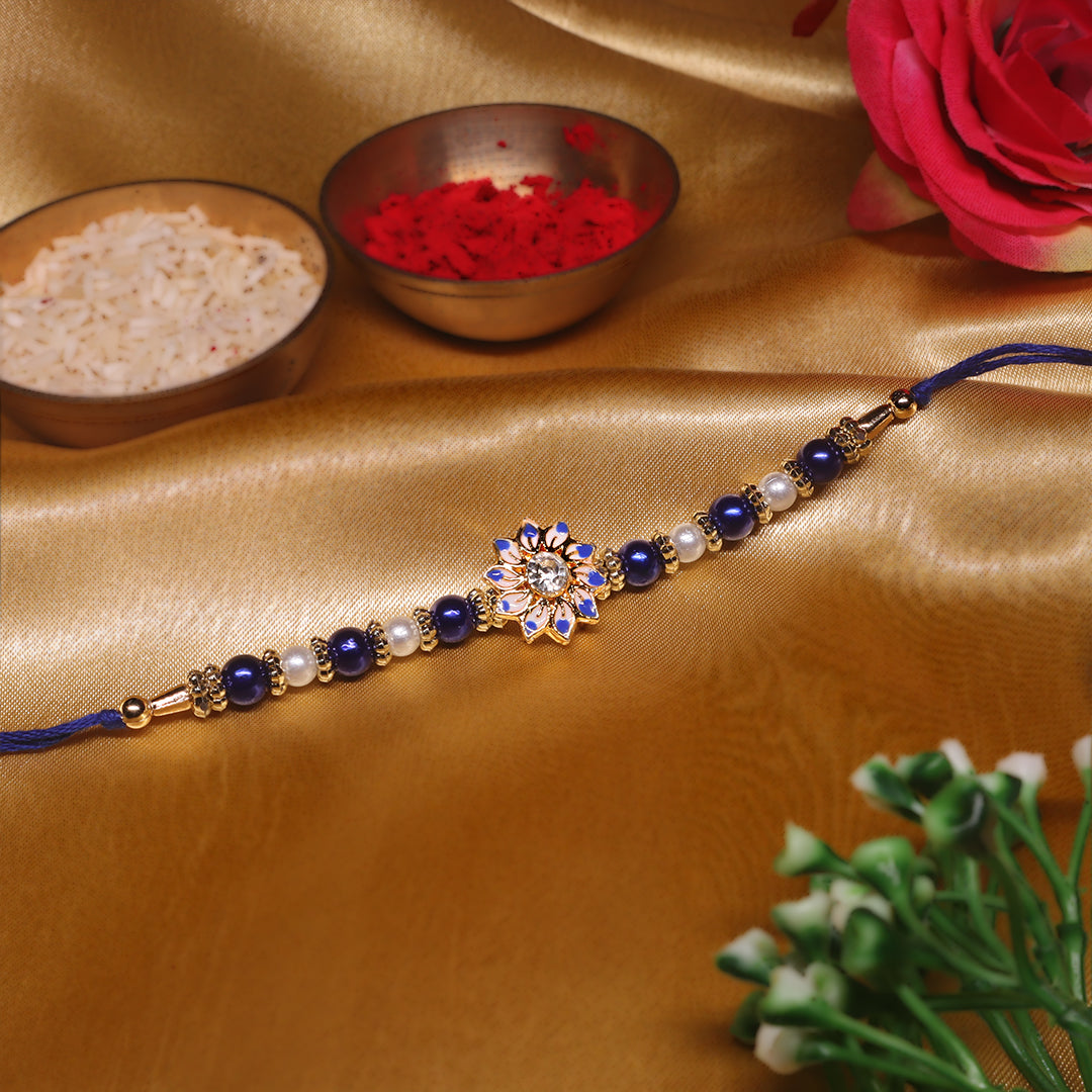 Festive Petals Rakhi Combo – A Twin Sparkle of Gold, Blue & Floral Elegance for Raksha Bandhan