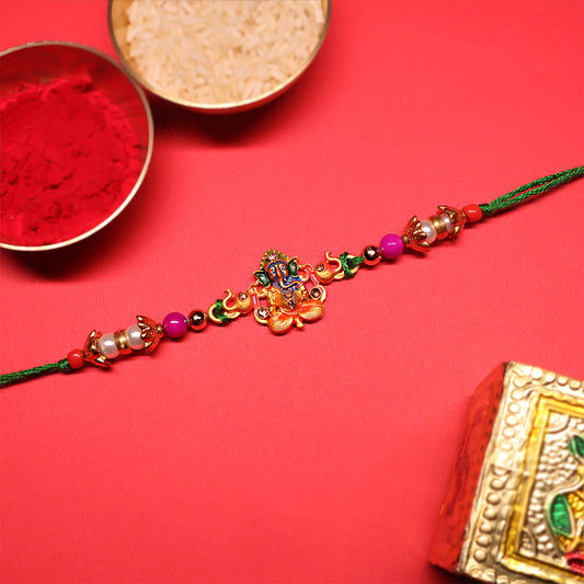 Festive Grace Rakhi Trio – Ganpati, Floral & Beaded Combo (Set of 3)