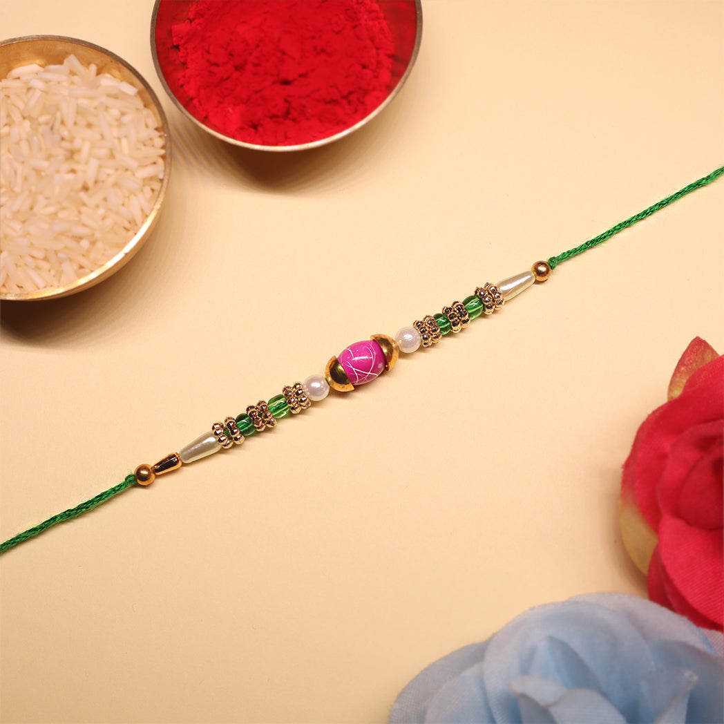 Festive Grace Rakhi Trio – Ganpati, Floral & Beaded Combo (Set of 3)