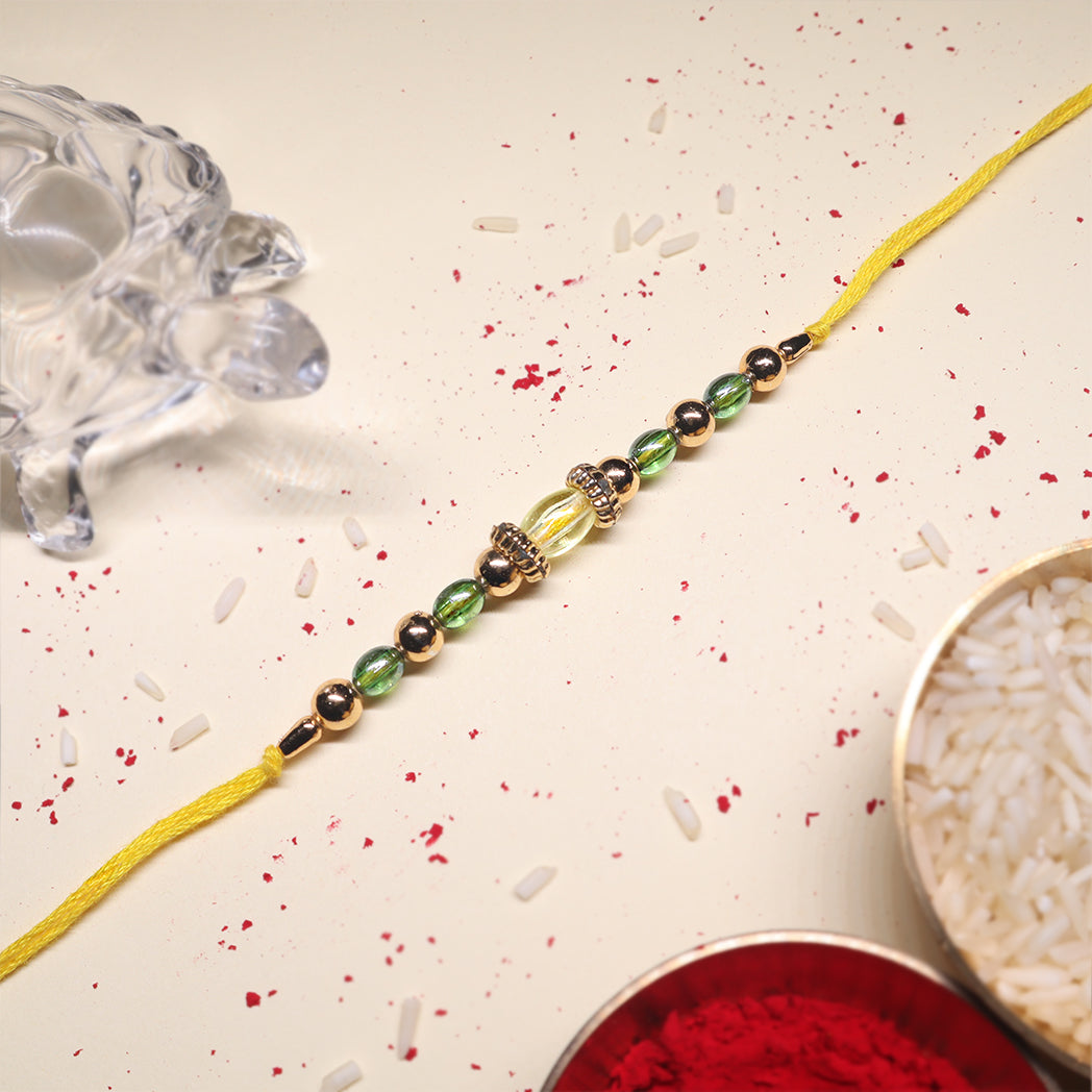 Traditional Charm Rakhi Pair – Lakshmi Blessing & Radiant Glass Beads