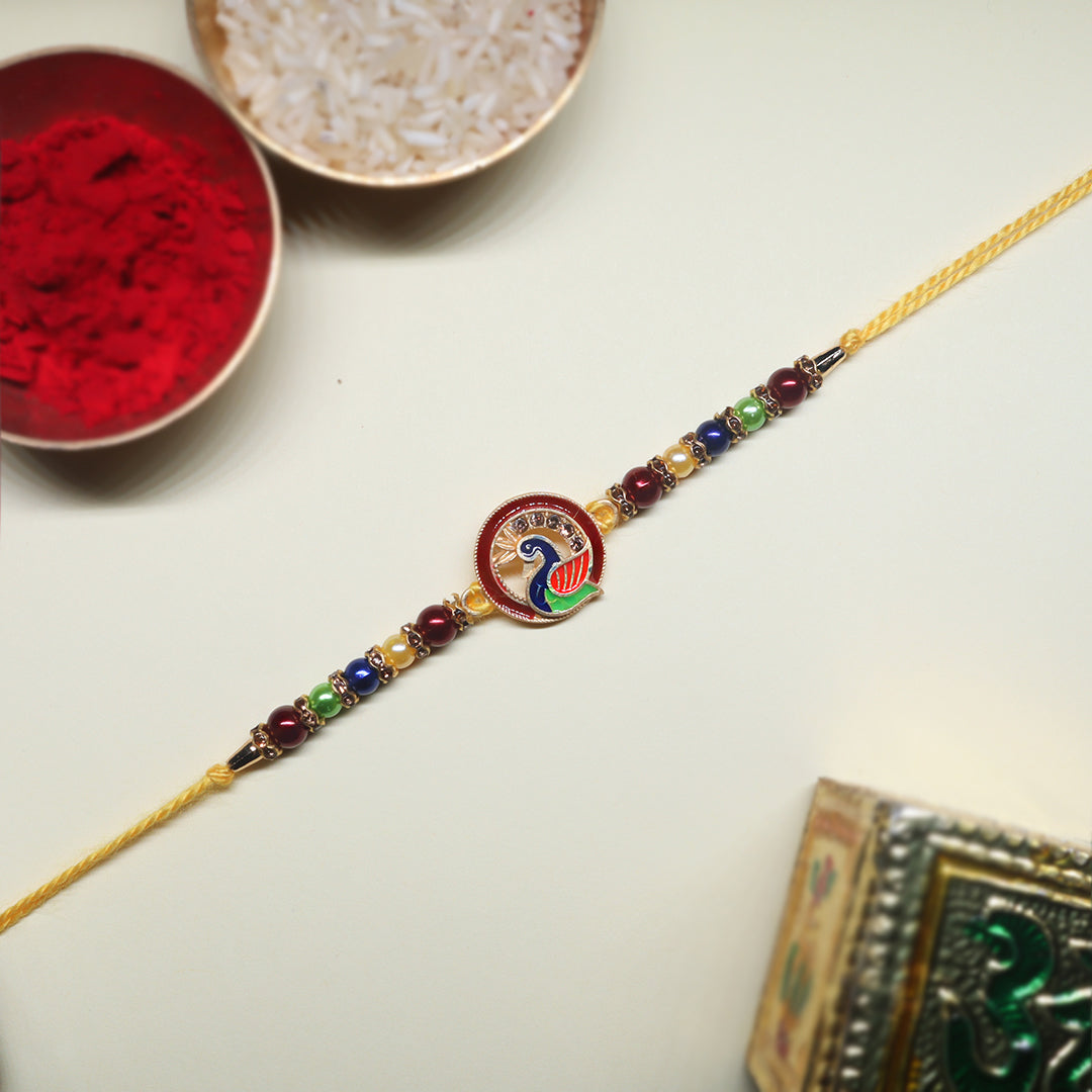 Peacock & Ganpati Rakhi Combo – A Divine Duo of Beauty & Protection ( Set of 2)