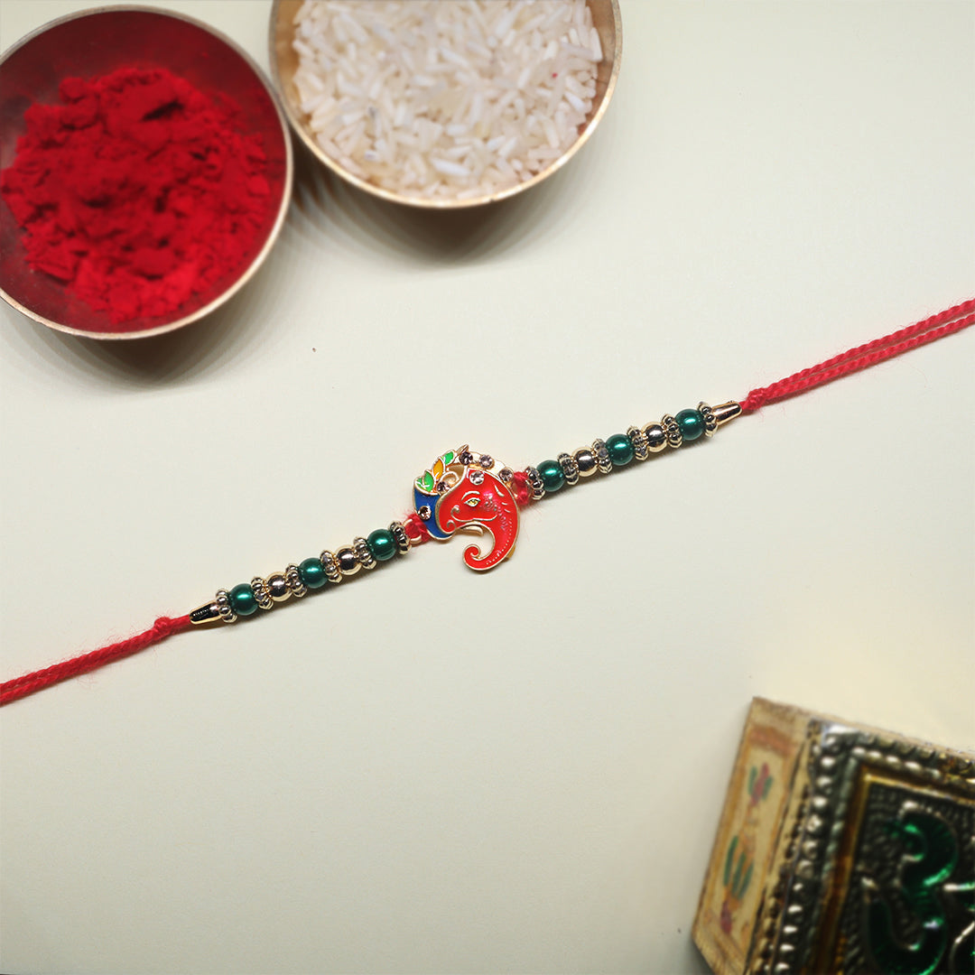 Peacock & Ganpati Rakhi Combo – A Divine Duo of Beauty & Protection ( Set of 2)