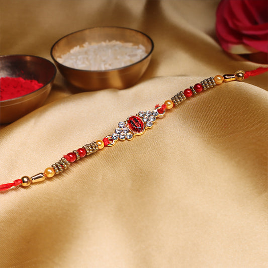 Elegant Elements Rakhi Set – Kundan Red, Royal Green & Artistic Enamel