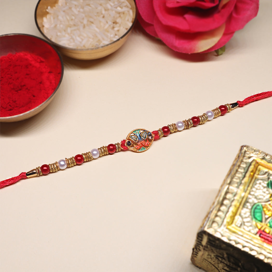 Elegant Elements Rakhi Set – Kundan Red, Royal Green & Artistic Enamel