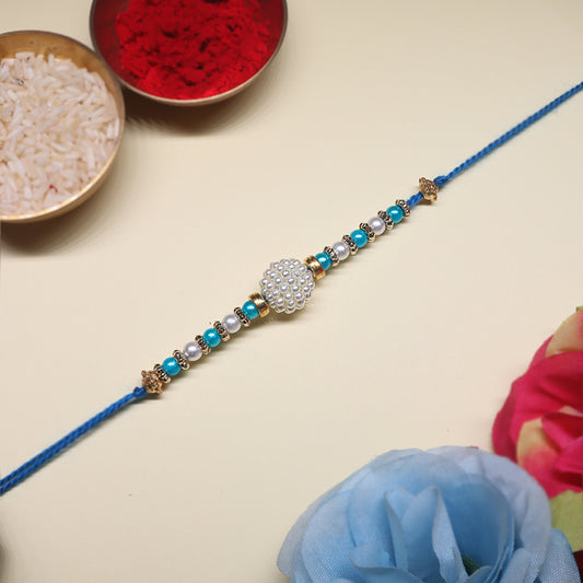 Neel Kamal Rakhi Pair – Aqua Blue Pearl Cluster & Floral Kundan Elegance (Set of 2)