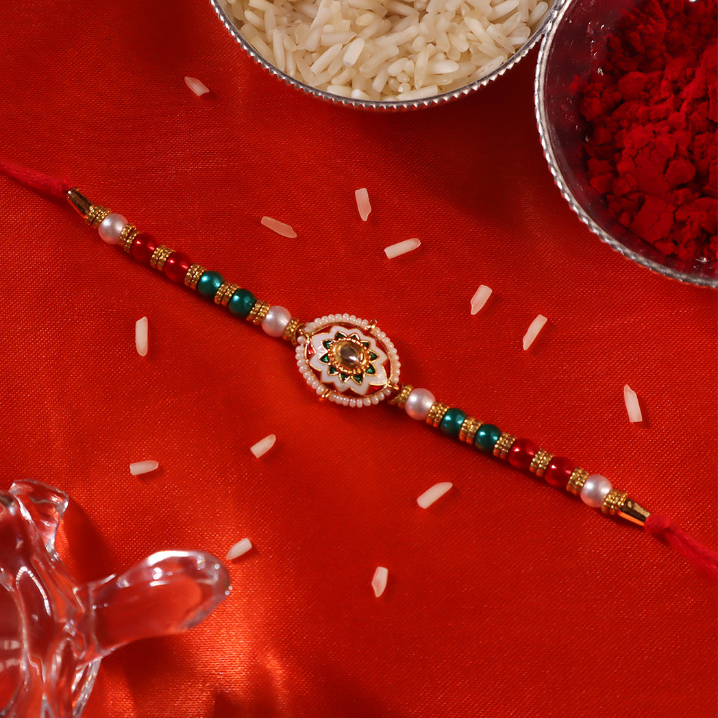 Divine Rakhi Combo – Floral & Round Centerpieces on Vibrant Threads