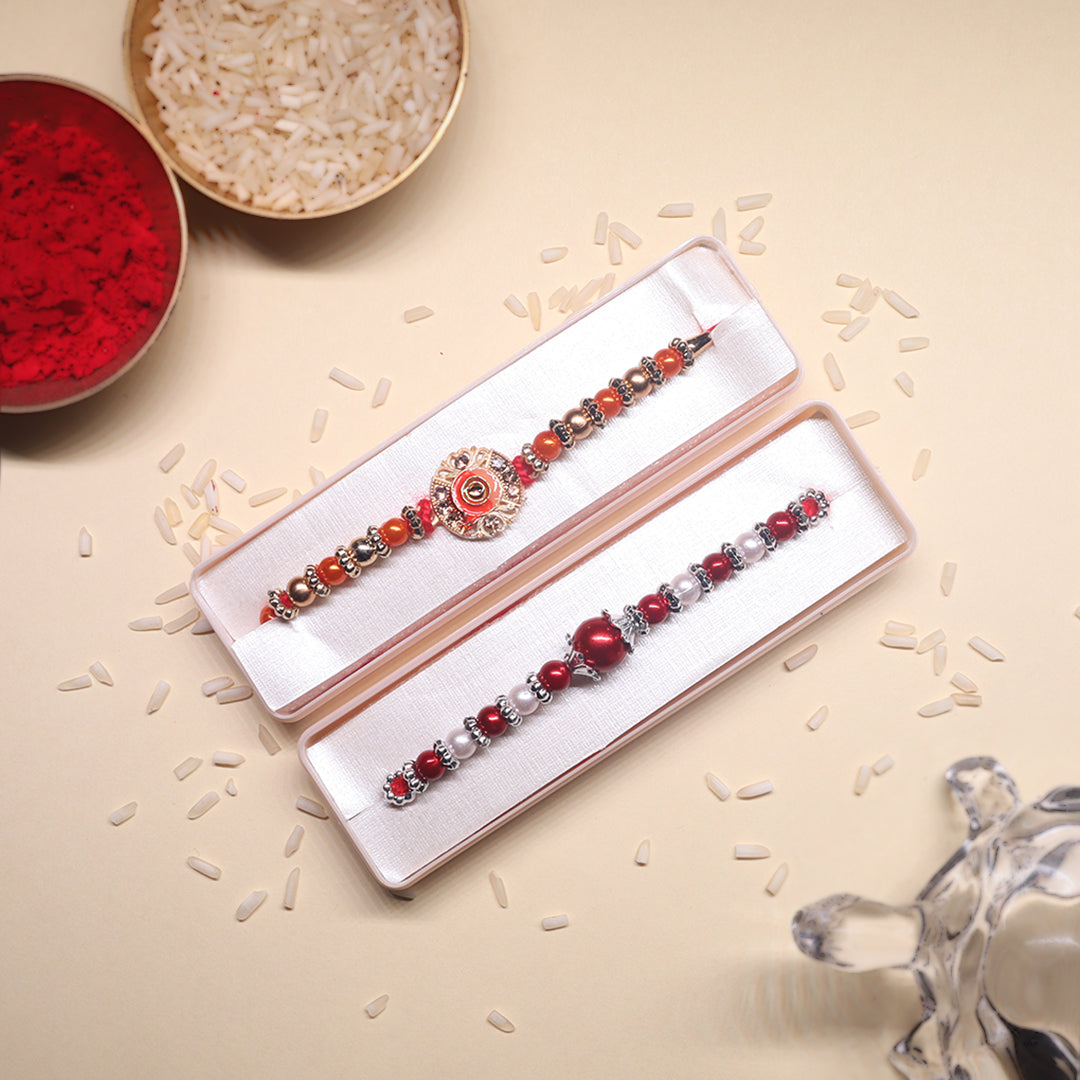 Shubh Laal Rakhi Pair – Celebrating Timeless Tradition in Crimson Glory & Sacred Affection (Set of 2)