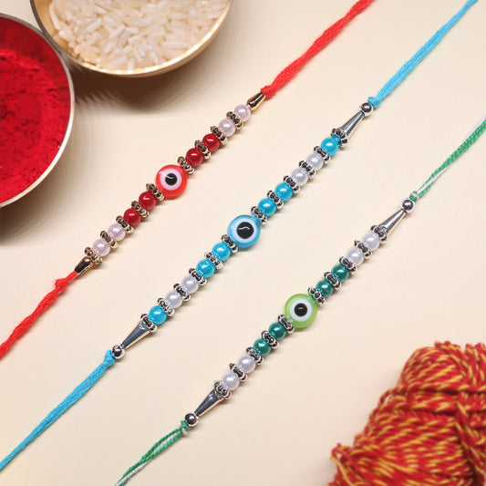 Nazar Rakhi Set – Multicolor Evil Eye Beaded Combo (Set of 3)