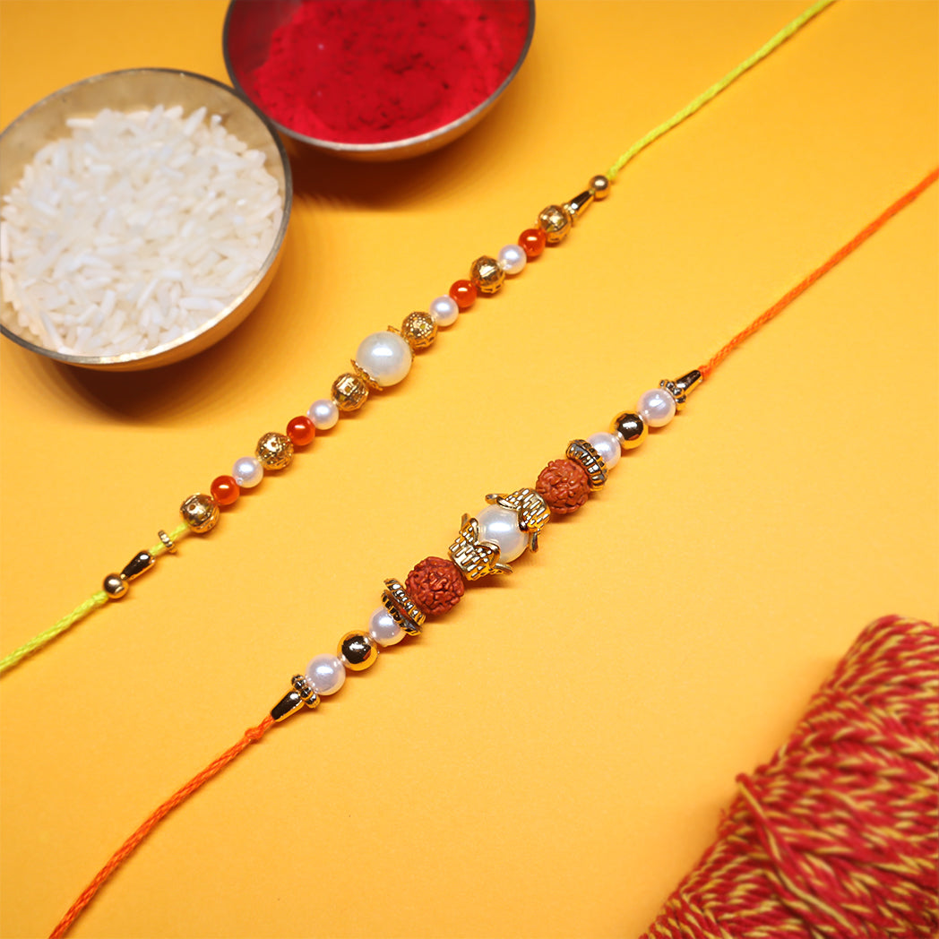 Rudraksha & Pearl Rakhi Combo – Sacred Threads of Protection