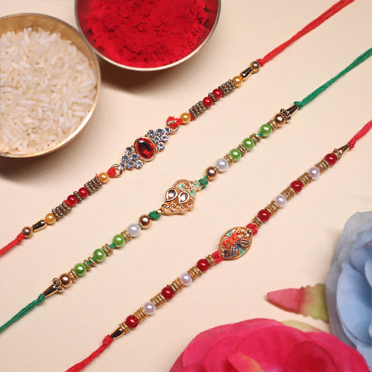 Elegant Elements Rakhi Set – Kundan Red, Royal Green & Artistic Enamel
