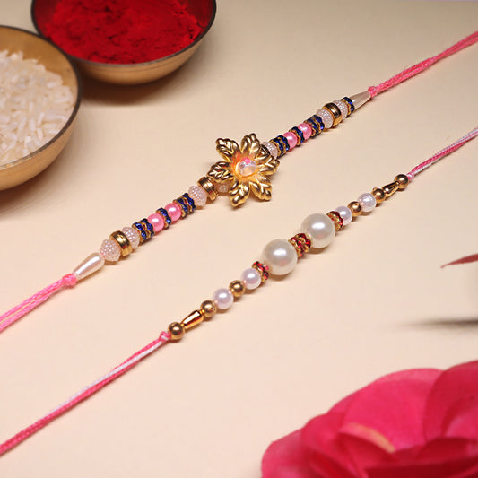 Grace & Glow Rakhi Trio – Golden Bloom, Pearl Blush & Pink Radiance