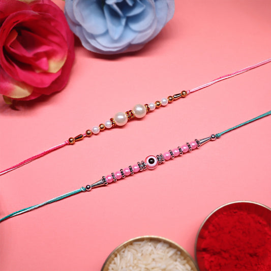 Pink Harmony Rakhi Set – Classic Pearl & Evil Eye Beaded Combo (Set of 2)