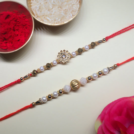 Swarna Sutra Rakhi Set – A Sacred Pair of Golden Radiance & Divine Grace (Set of 2)