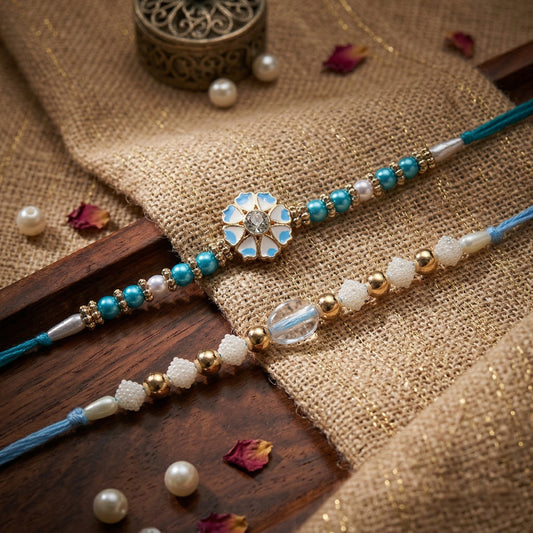 Neel Kamal Rakhi Pair – Aqua Blue Pearl Cluster & Floral Kundan Elegance (Set of 2)